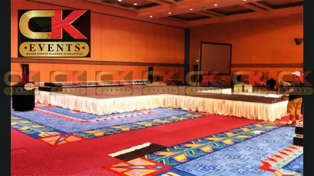 24×32 foot stage and 8×16 foot runway platform setup in convention hall