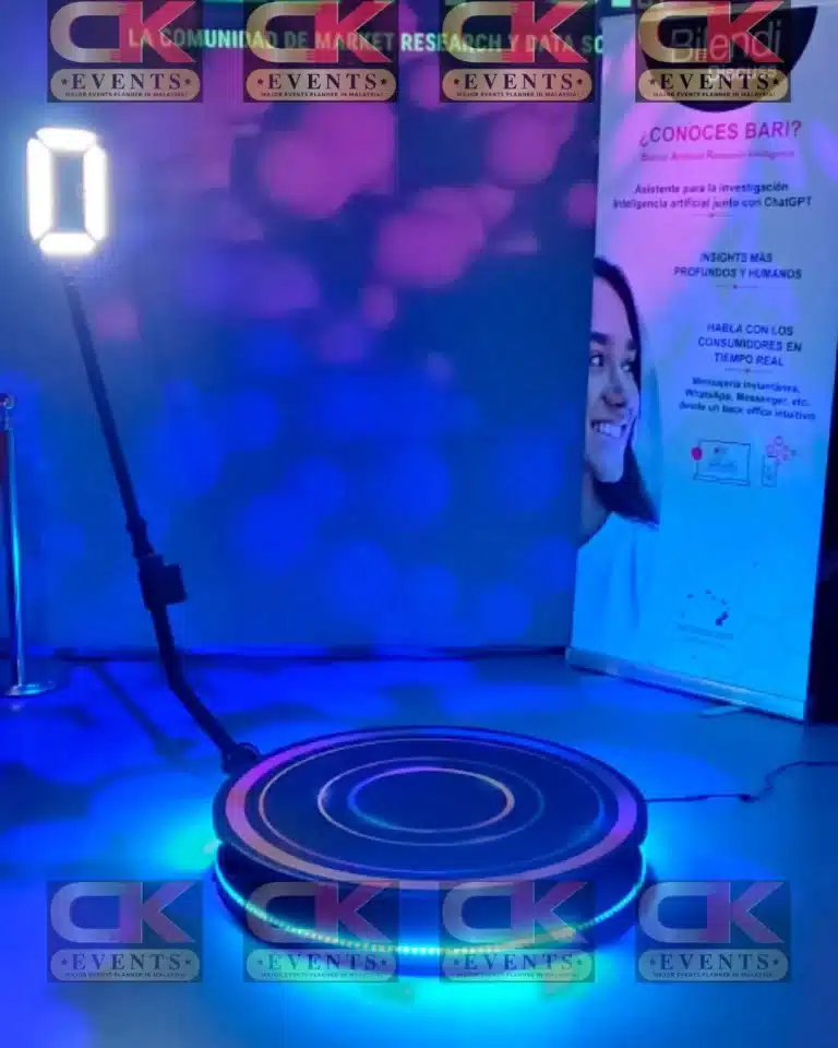 Blue neon 360 video booth platform with LED ring light – CK Event Management photobooth rental for corporate events in Kuala Lumpur & Selangor, Malaysia.