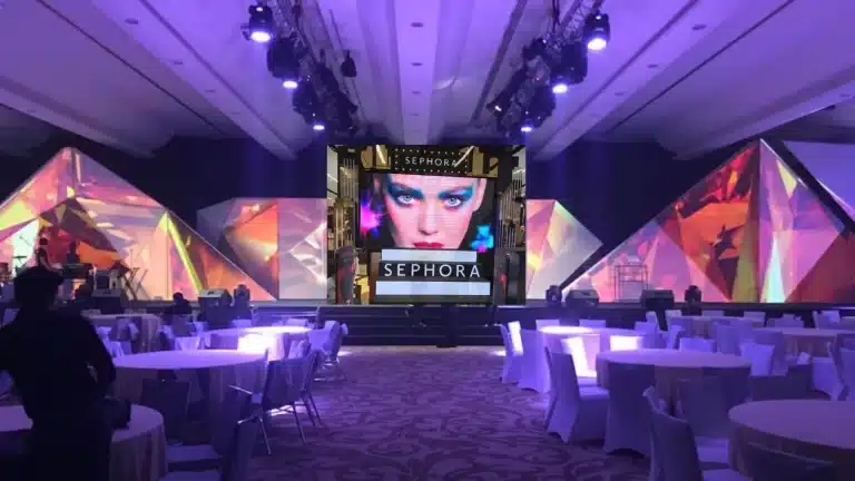 “Kuala Lumpur LED screen rental — centre LED wall with creative side visuals for product showcase.”
