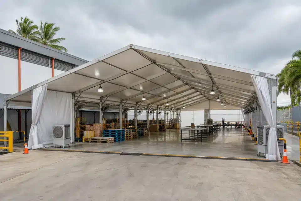Clear span long term shelter sample in Malaysia industrial yard with open temporary covered workspace