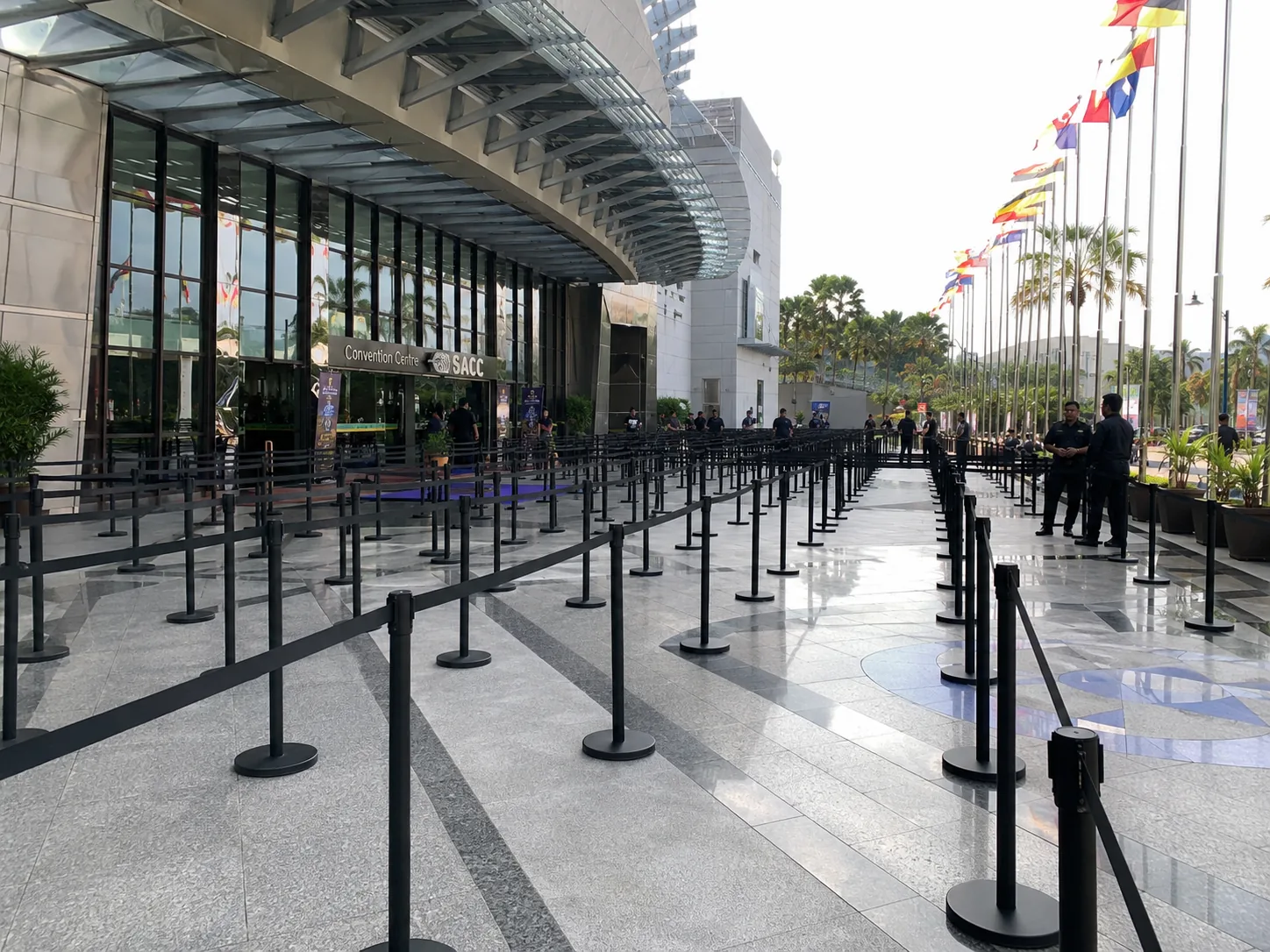 Very large black Q pole and black 2 meter belt deployment at Shah Alam Convention Centre entrance